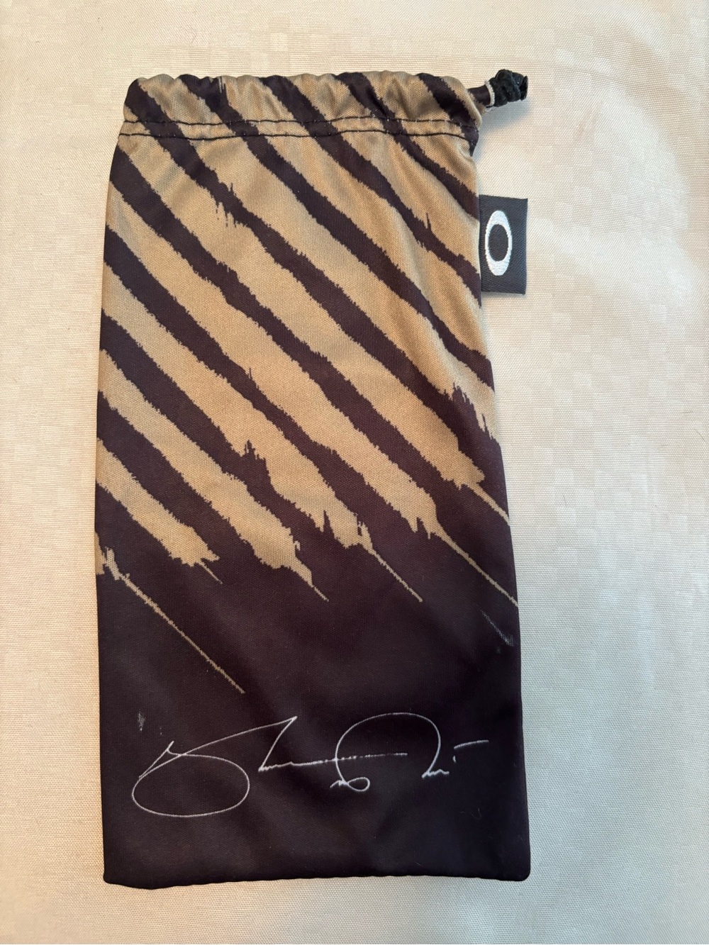 Oakley Shaun White Black and Tan Drawstring sunglass protective bag